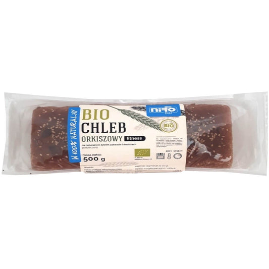 Vollkorn-Dinkelbrot von NIRO, BIO-Fitness Dinkelbrot in 500 g, frisch und knusprig, auf einem Holzteller serviert.