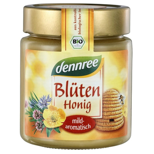 Bio Blütenhonig von DENNREE in einem 500 g Glas, goldgelbe Farbe und flüssige Konsistenz, ideal für Honigliebhaber.