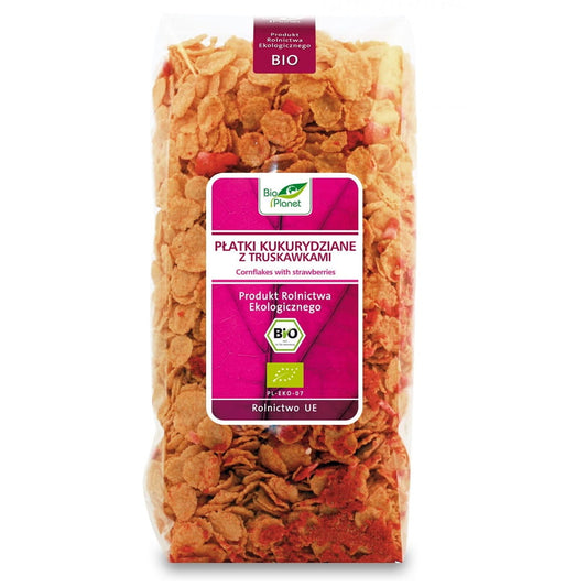 Bio Cornflakes mit Erdbeeren von BIO PLANET, 300 g, in einer Schüssel mit frischen Erdbeeren und Milch.