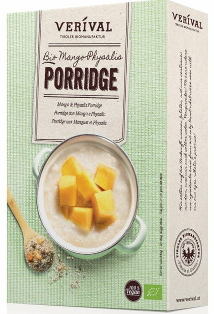 Bio Haferflocken mit Mango und Apfelfrucht, 450 g, von VERIVAL, in einer offenen Packung mit Hafer, Mango und Apfelstücken.