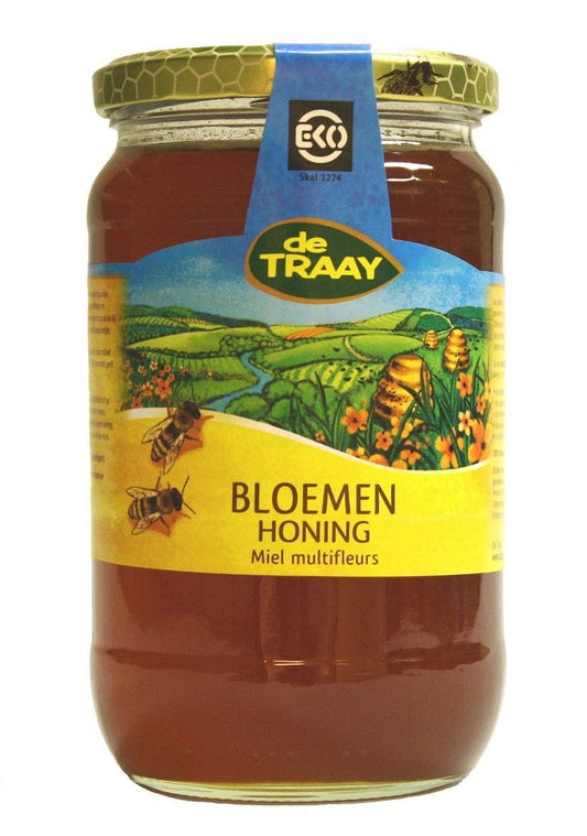 Bio Blütennektarhonig von DE TRAAY in 900 g Glas, goldene Farbe, flüssig mit Blütenaromen, nachhaltige Imkereiproduktion
