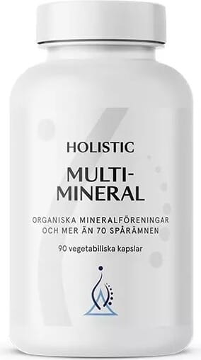 Mehrere HOLISTIC Multimineralmineralien 90 Kapseln in einer Dose, Nahaufnahme der Verpackung mit Label und Kapseln.