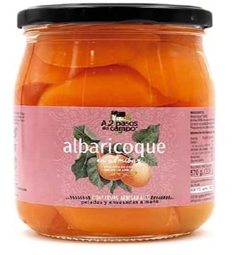 Glutenfreie Bio-Aprikosen in Reissirup von A2 PASOS DEL CAMPO, 570 g, in einer geöffneten Packung mit Aprikosen und Reissirup.