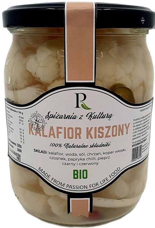 Eingelegter Blumenkohl in Glas, 300 g, von biogo, mit gelben und weißen Kohlstücken in Essig eingelegt, auf einem Teller.