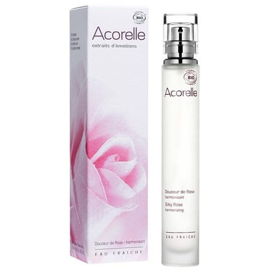 Bio-Eau fraîche Rose von ACORELLE in einer transparenten Flasche mit Rosenblüten, ideal für erfrischende Hautpflege.