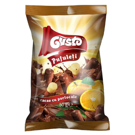 Maischips in Schokolade mit Orangengeschmack, 50g, GUSTO PUFULETI, Nahaufnahme der knusprigen Snacks in Schokolade