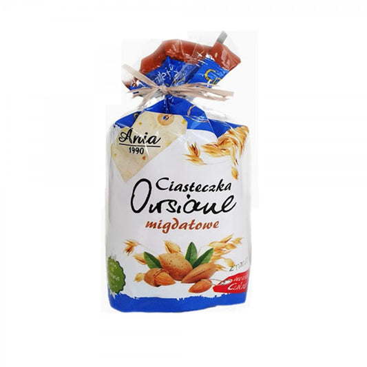Haferkekse mit Mandeln von ANIA, 150 g, liegen auf einem Teller, sichtbar mit knuspriger Oberfläche und Mandeln darin.