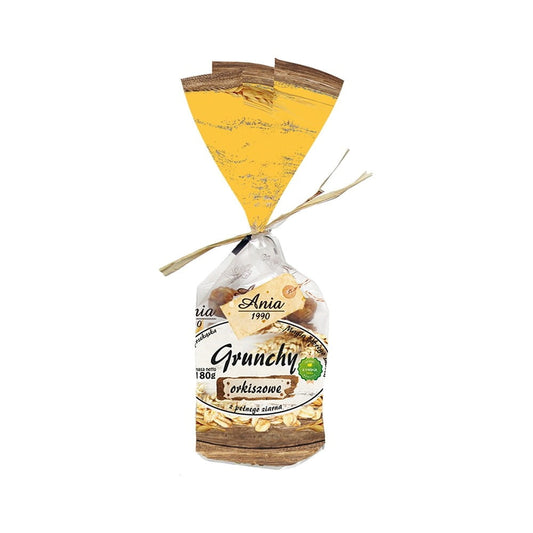Dinkel-Flocken von ANIA in einer 180 g Packung, Nahaufnahme der Grunchy 4 Dinkelflocken in einer Schüssel