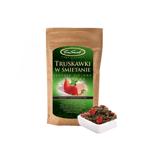 Grüner Desserttee von TEN SMAK mit Erdbeeren in Sahne, 40 g, zeigt frische Erdbeerstückchen und grünen Tee in einer Packung