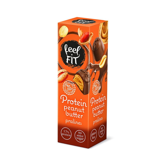 Proteinpralinen mit Erdnussbutter von Feel FIT, 33 g, detailreiche Nahaufnahme der Schokoladen- und Erdnussfüllung